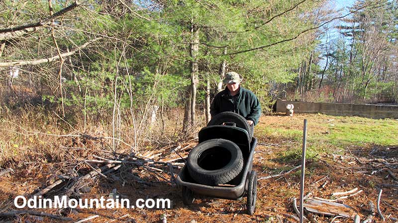 Moving tires in a wheelbarrow to the air rifle range